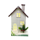 Świąteczna chatka z bali z brązowym dachem i oświetleniem LED